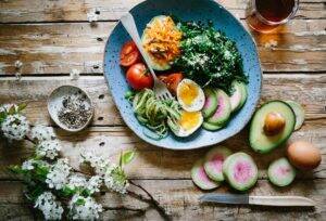 bowl of healthy food and other foods