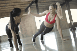 Two women doing partner training together