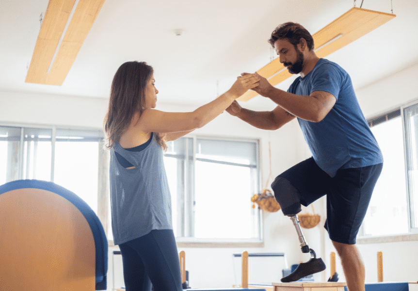 Image of a physical therapist working with a client.